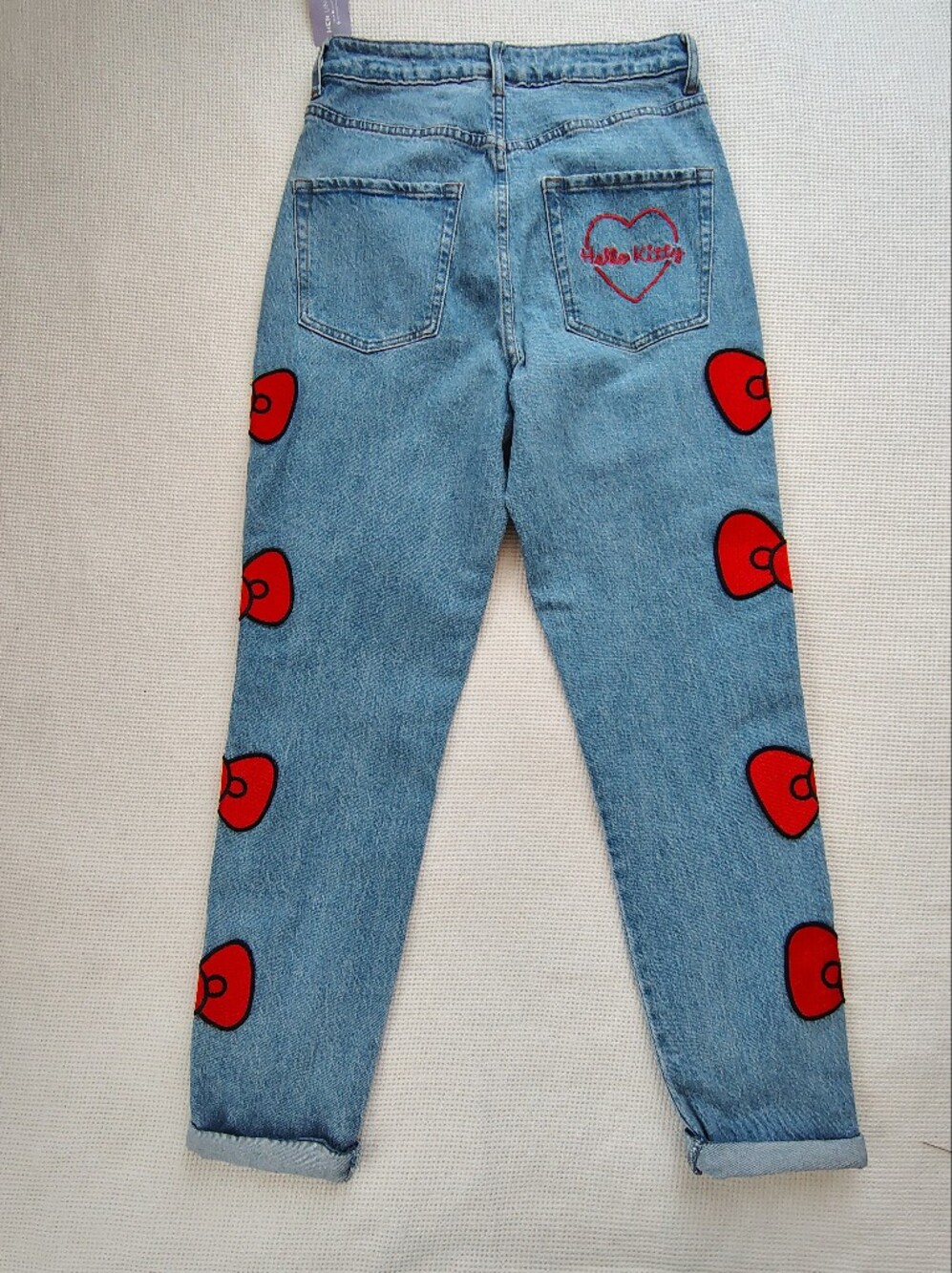 Hello Kitty Light Blue High-Rise Jeans with Red Bow Appliqués - Picture 2 of 15